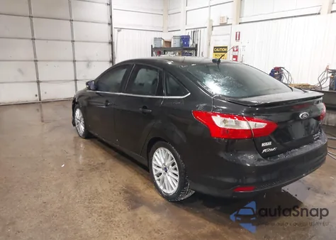 2014 Ford Focus Titanium из США, поврежденный, VIN 1FADP3J27EL148933